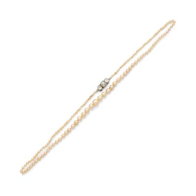 un bracelet en perles et diamants
