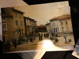 a picture of a postcard of a street scene
