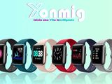 five different colors of smart watches on a blue background