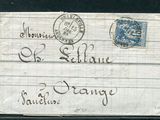 une vieille enveloppe sur laquelle est collé un timbre comportant une inscription