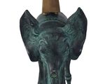statue of an elephant with a cone on top of it ' s head