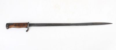 a knife with a wooden handle on a white surface