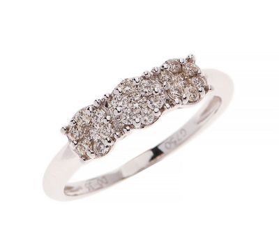 a white gold ring with three rows of diamonds