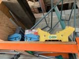 a box of tools on a shelf in a room under construction