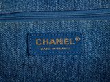 a chanel blue denim shoulder bag with gold hardware