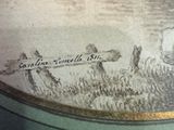 a picture of a painting on the wall of a room