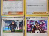 quatre cartes représentant différents personnages, posées sur une table