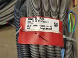 a bunch of wires that have been wrapped in a red tag