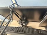 a television that is connected to a keyboard and mouse