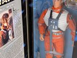 a star wars action figure that is in the box
