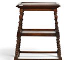 a small wooden table with a shelf on top of it