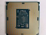 a close up of a cpu chip on a white surface