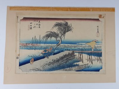 une image représentant une photo d'un tableau représentant une plage et un palmier