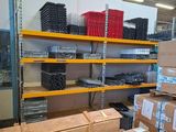 many boxes and boxes on the shelves in the warehouse