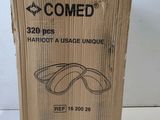an open cardboard box with a pair of glasses on top of it