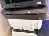 a stack of printers sitting on top of each other