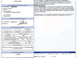 a document with a picture of a car registration form on it
