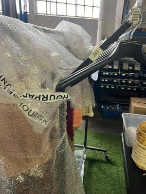a plastic bag that has a hanger on it