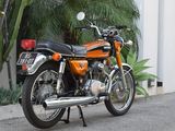 a motorcycle that is parked on the side of the road