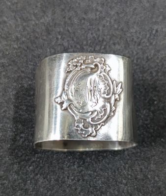 an image of a silver ring with a woman ' s face on it