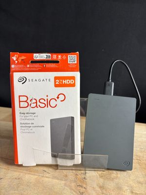 an image of a box of a hard drive sitting on top of a wooden table