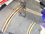 a pile of toy train tracks on a table