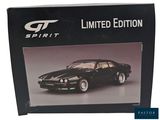 the box has a picture of a black sports car on it