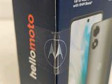 the box of the motorola phone is open on the table