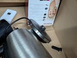 a box with a coffee pot and a kettle on it