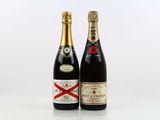 two bottles of wine sitting next to each other on a table