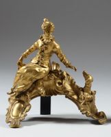 Paire de chenets en bronze doré ciselé à décor d'un couple a… (photo 2)