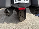 a close up of a motorcycle with a license plate on it