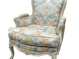 an image of a chair with a floral upholstered back