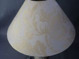 a lamp that is sitting on a table in a room