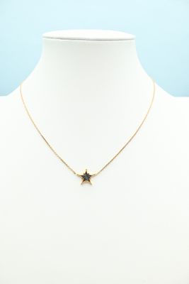 a gold star necklace on a mannequin mannequin mannequin mannequin mannequin mannequin mannequin mannequin manne