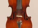 an old violin with a bow hanging from it ' s neck