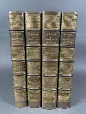 un lot de cinq livres anciens à la couverture dorée