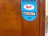 a close up of a door with a sticker on it