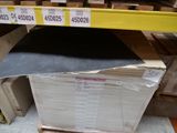 a stack of boxes on a pallet in a warehouse