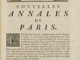 un vieux livre dont la couverture est ornée d'une illustration représentant un animal