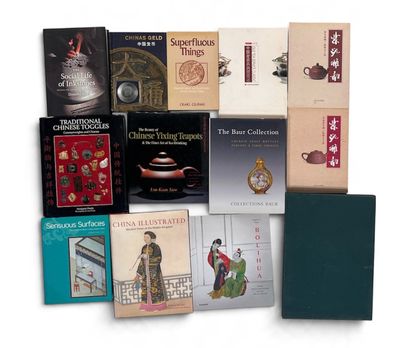 a lot of books that are sitting on a table