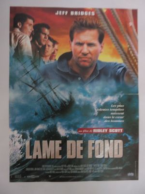 L'affiche du film *Lame de fond* est accrochée au mur.