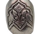 an image of a silver ring with a bird and flowers on it