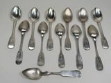 a lot of spoons and spoon spoons on the table