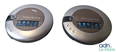two speakers that are sitting side by side on a table