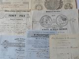 several old documents are stacked on top of each other