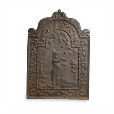 an old cast iron plaque with a man and a woman on it