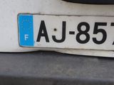 a close up of a license plate on a car