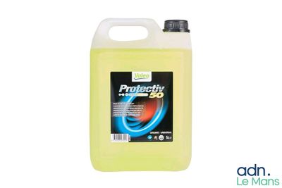 a gallon of yellow liquid on a white background