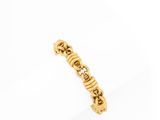 a gold ring with the word ' love ' written on it